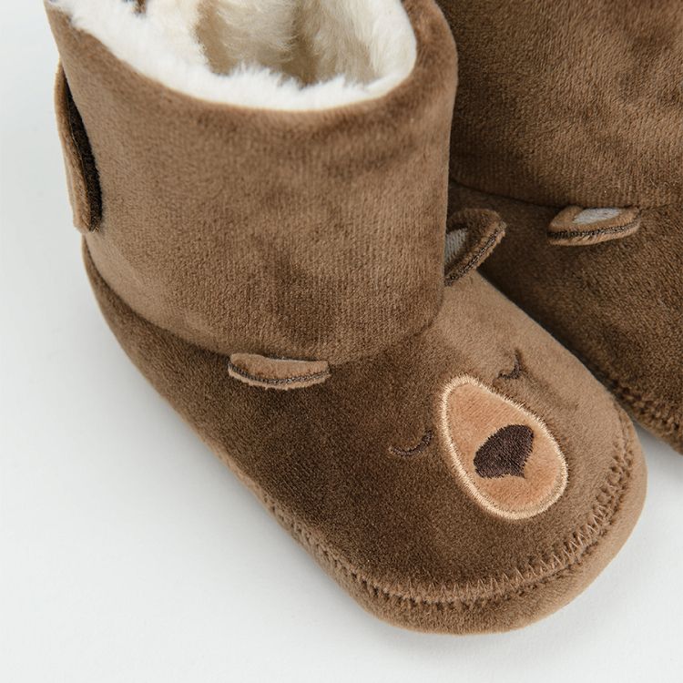 Brown newborn slippers with bear pattern