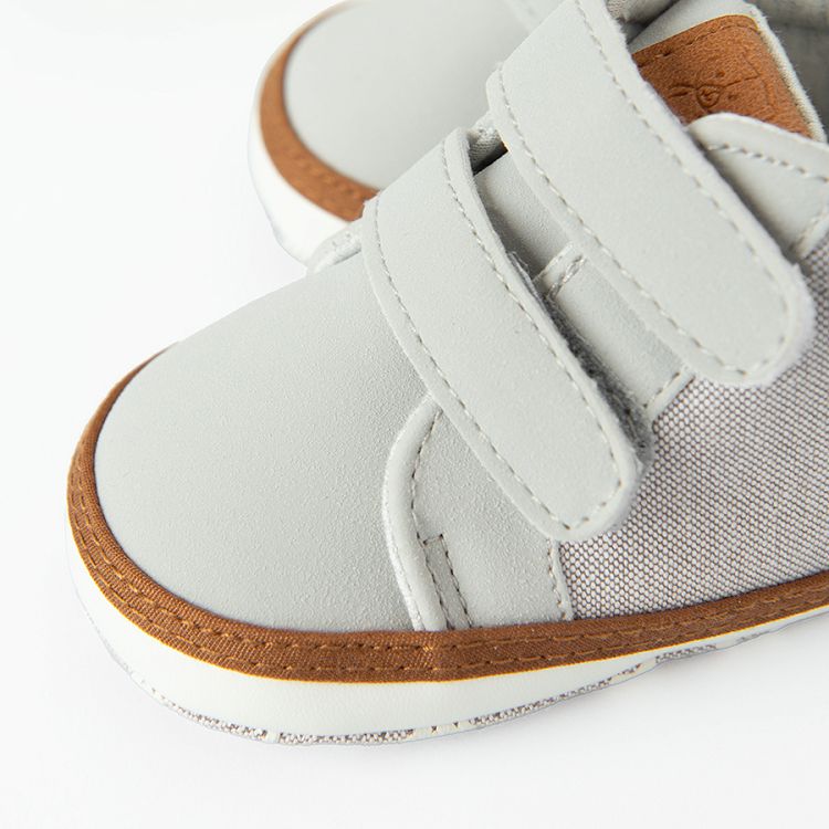 Grey newborn slippers with scratch