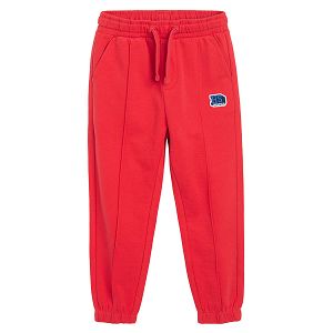 Red jogging pants