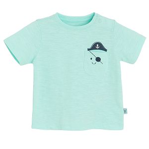 Light turquoise T-shirt with pirate print on the chest pocket