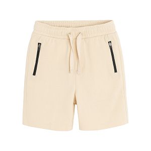 Beige shorts with cord on waist