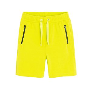 Yellow shorts with cord on the waist