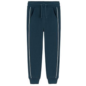 Blue jogging pants with white stripe