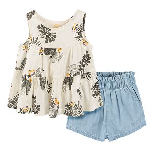 White sleeveless blouse and light blue shorts clothing set