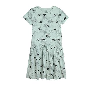 Light blue short sleeve dress with black patterns