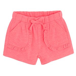 Fucshia shorts with ruffles on side pockets