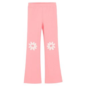 Pink wide leg pants with daisies print on knees