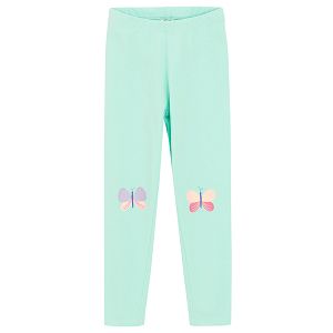 Mint leggings with butteflies on the knees