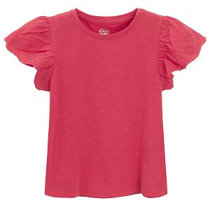 Pink short sleeve blouse with ruffle on shoulders