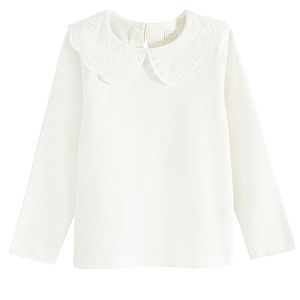 White long sleeve blouse with ruffle on the neckline