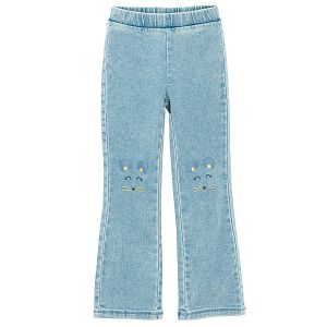 Light blue denim pants with kitten pattern on the knees